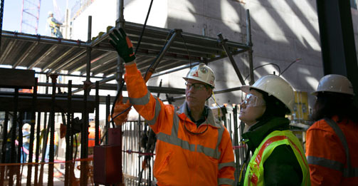 NRC Commissioner Kristine Svinicki is briefed on the status of construction at the Vogtle nuclear plant by Southern Nuclear Operating Company Executive Vice President Mark Rauckhorst. Photo courtesy of Southern Nuclear.