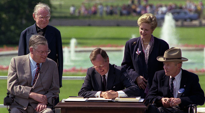 President Bush signs the Americans with Disabilities Act