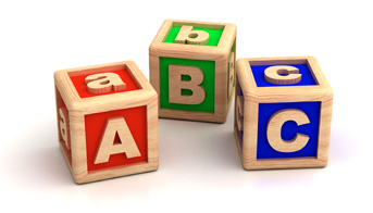 Wooden block with the letters A, B, and C