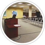 large room with presentation station and theater seating