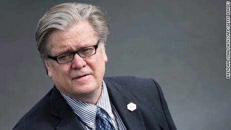 Strategist Steve Bannon waits while US President Donald Trump arrives at Lynchburg Regional Airport May 13, 2017 in Lynchburg, Virginia. / AFP PHOTO / Brendan Smialowski        (Photo credit should read BRENDAN SMIALOWSKI/AFP/Getty Images)