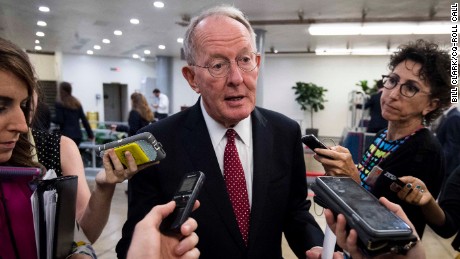 UNITED STATES - JULY 27: Sen. Lamar Alexander, R-Tenn., speaks with reporters as he waits for the Dirksen/Hart subway in the Capitol on Thursday, July 27, 2017. (Photo By Bill Clark/CQ Roll Call)