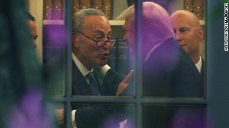 WASHINGTON, DC - SEPTEMBER 06:  U.S. Senate Minority Leader Chuck Schumer (D-NY) (L) makes a point to President Donald Trump in the Oval Office prior to his departure from the White House September 6, 2017 in Washington, DC. President Trump is traveling to North Dakota for a tax reform event with workers from the energy sector.  (Photo by Alex Wong/Getty Images)