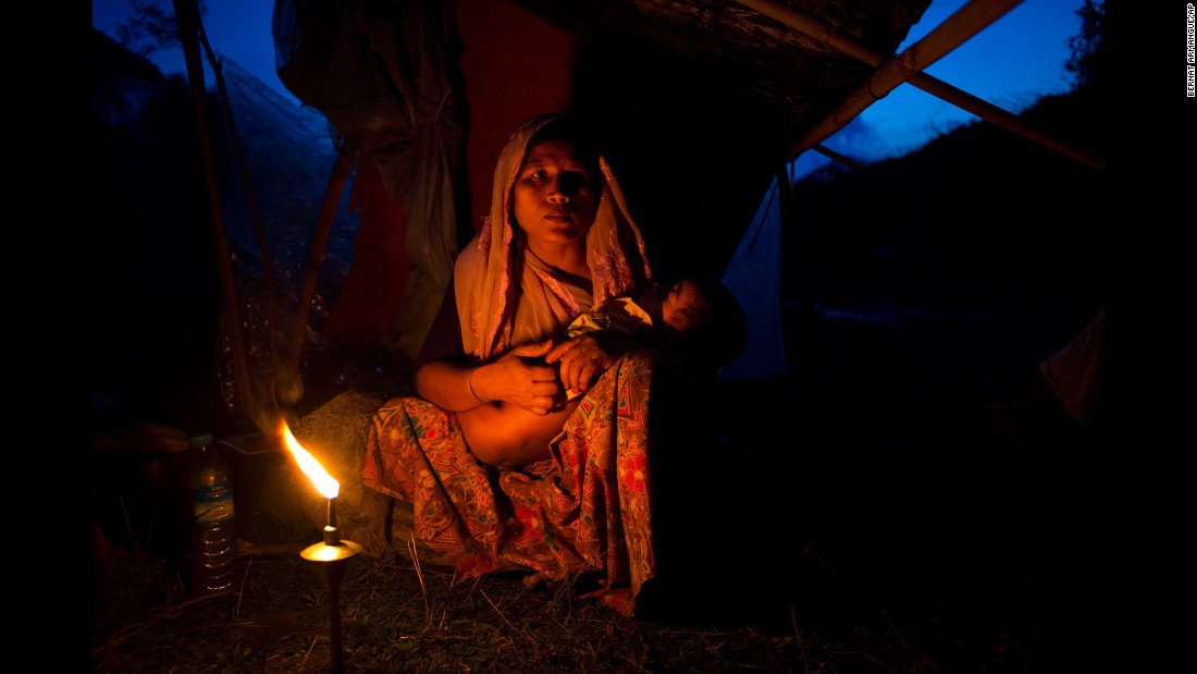 A Rohingya woman from Myanmar cradles her child at a temporary camp in Bangladesh on Saturday, September 2. More than 120,000 Rohingya &lt;a href=&quot;http://www.cnn.com/2017/09/05/asia/rohingya-mass-protest-report/index.html&quot; target=&quot;_blank&quot;&gt;have fled to Bangladesh&lt;/a&gt; to escape violence in their native Rakhine State, according to a United Nations official in Bangladesh.