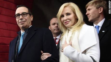 This is a January 20, 2017 file photo of then Treasury Secretary-designate Stephen Mnuchin and his then fiancee, Louise Linton, on Capitol Hill in Washington, for the presidential inauguration of Donald Trump. 