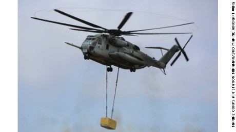 A CH-53E Super Stallion carries a 20,000-pound training load during external lift training at Marine Corps Base Camp Pendleton in California on June 5. 