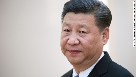 China&#39;s President Xi Jinping waits to greet foreign affairs officials from the BRICS countries at the Great Hall of the People&#39;s Fujian Room in Beijing on June 19, 2017.  / AFP PHOTO / POOL / Nicolas ASFOURI        (Photo credit should read NICOLAS ASFOURI/AFP/Getty Images)