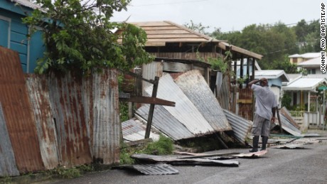 A man surveys the wreckage on his property after the passing of Hurricane Irma, in St. John&#39;s, Antigua and Barbuda, Wednesday, Sept. 6, 2017. Heavy rain and 185-mph winds lashed the Virgin Islands and Puerto Rico&#39;s northeast coast as Irma, the strongest Atlantic Ocean hurricane ever measured, roared through Caribbean islands on its way to a possible hit on South Florida. (AP Photo/Johnny Jno-Baptiste)