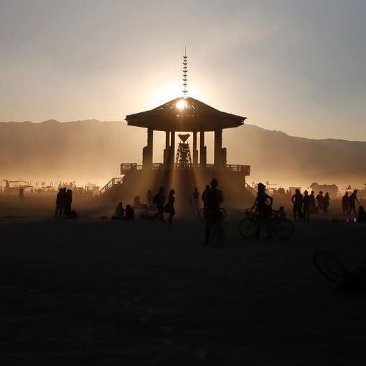 Participants watch the sun set behind the Man as approximately 70,000 people from all over the world gathered for the annual Burning Man arts and music festival in the Black Rock Desert of Nevada, U.S. September 2, 2017. REUTERS/Jim Urquhart @jimurquhartpics #burningman #nevada #reuters #reutersphotos #sunset