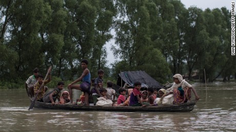 Rohingya Muslim refugees make their way into Bangladesh after crossing the border on September 7.