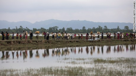 Rohingya Muslim refugees make their way into Bangladesh after crossing the border on September 07.