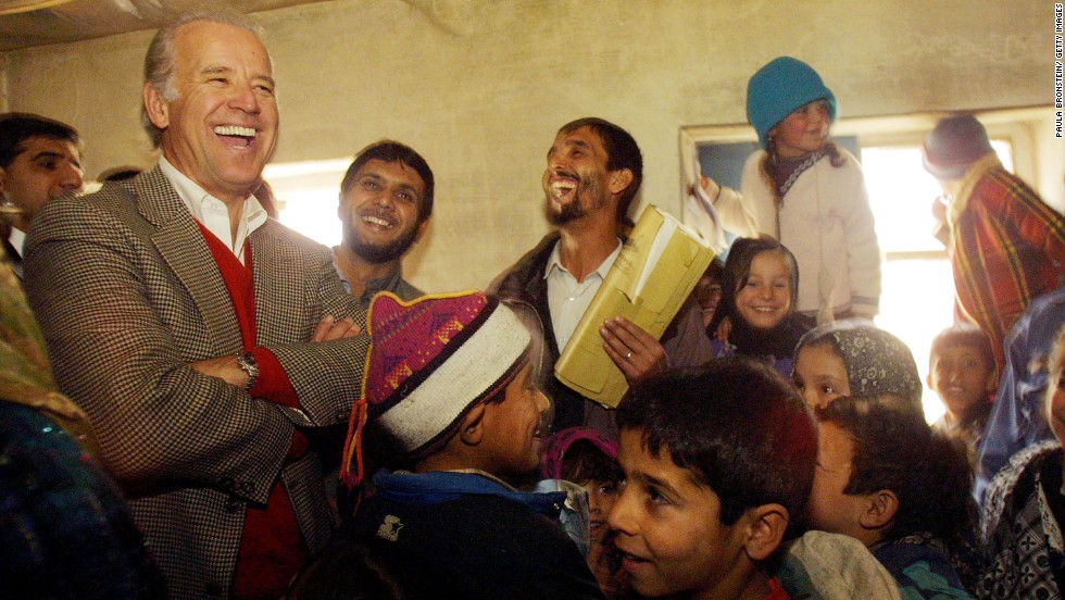 While chairman of the Senate Foreign Relations Committee, Biden meets Afghan students during a visit to Kabul in 2002.