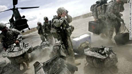 US soldiers disembark from a Chinook helicopter at an undisclosed location in the Ghazni province of Afghanistan, some 200 km south west of Kabul, 28 May 2007.  Around 400 US soldiers and over a thousand Afghan National army soldiers and Afghan National police officers will push into Ghazni province to combat Taliban insurgents in the upcoming month. AFP PHOTO/ Nicolas ASFOURI / AFP PHOTO / NICOLAS ASFOURI        (Photo credit should read NICOLAS ASFOURI/AFP/Getty Images)