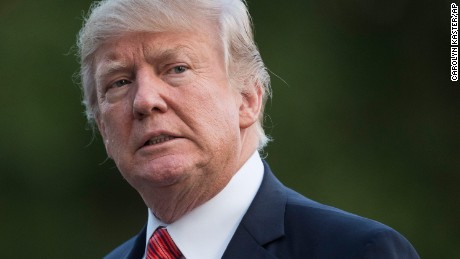 FILE - In this Aug. 23, 2017 file photo, President Donald Trump walks on the South Lawn of the White House in Washington. The president lashed out at Republican leaders in Congress, suggesting efforts to increase the country&#39;s borrowing limit to avoid an economic-rattling default on the nation&#39;s debt are &quot;a mess!&quot; (AP Photo/Carolyn Kaster)