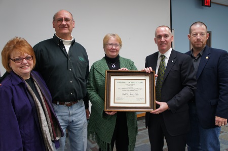 Todd Fore holding award. Mickey and Jerry Wircenski, Linda Schamber, Todd Fore, Jeff Allen