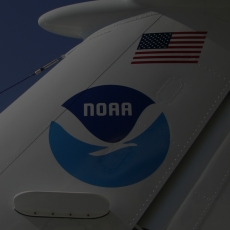 The tail of a NOAA aircraft.