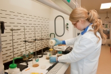 A researcher sampling microplastics in the lab.