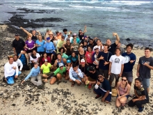 A group of people on a beach.