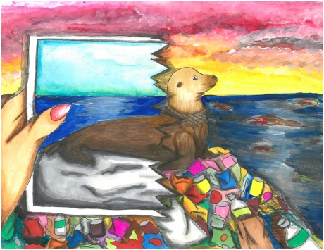 Child&#039;s artwork of a seal on a rock with marine debris while someone holds up a photo of a seal on a clean beach.