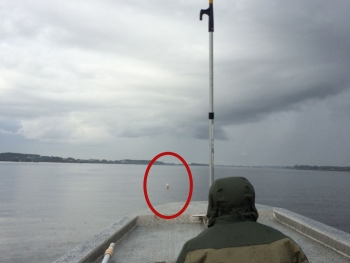 SCDNR staff strike a float to test durability. 