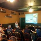 Woman speaking to a group.