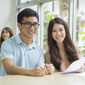 International students filling out visa forms to study in the USA