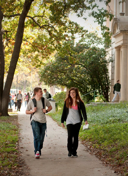 students walking in front of Matthews Hall