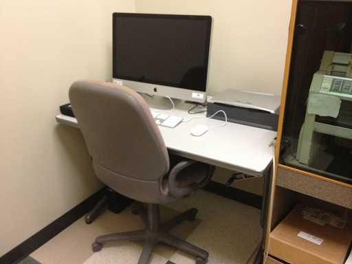 photo of the isolation room set up with chair and desk