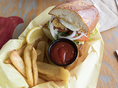 sandwich and fries in a food basket