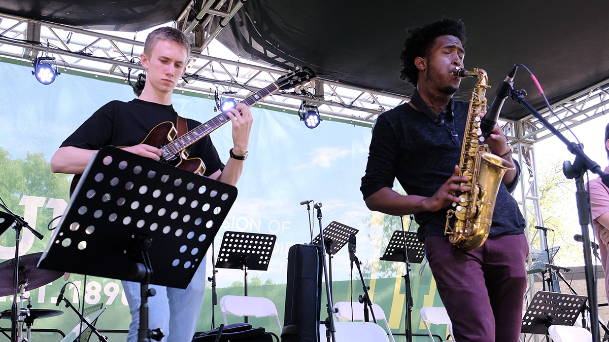 Ethan Ditthardt, guitar, Patrick Hill, saxophone. Denton Arts &amp; Jazz Festival 2019. Photo by Christopher Walker.