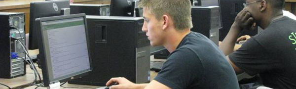 unt student at a computer