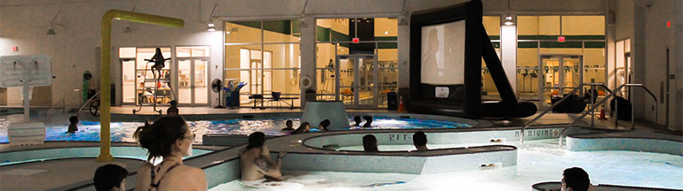 people watching movie in pool