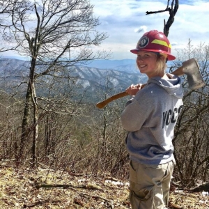 Emily Johnson holding an axe