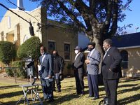 Elder Emery Tease, of Dallas West Church of Christ (at microphone), speaks at a news conference at True Lee Baptist Church in South Dallas on Dec. 7, 2020. Tease and other southern Dallas faith leaders gathered to discuss the uptick in crime in the area. (Ashley Moss/Texas Metro News)