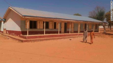 People inside the Government Science Secondary School in Kankara, Nigeria, Saturday Dec. 12, 2020. Nigerian police say that hundreds of students are missing after gunmen attacked the secondary school in the country&#39;s northwestern Katsina state. Katsina State police spokesman Gambo Isah said in a statement that the Government Science Secondary School in Kankara was attacked Friday night by a large group of bandits who shot with AK-47 rifles. (AP Photo/Abdullatif Yusuf)