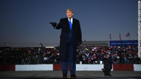 US President Donald Trump gestures as he arrives for a Make America Great Again rally at the La Crosse Fairgrounds Speedway, October 27, 2020, in West Salem, Wisconsin. (Photo by Brendan SMIALOWSKI / AFP) (Photo by BRENDAN SMIALOWSKI/AFP via Getty Images)