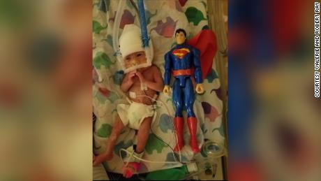 Logan weighed 1 pound and 71/2 ounces and was 12 inches tall at birth. The size of his Superman toy. 