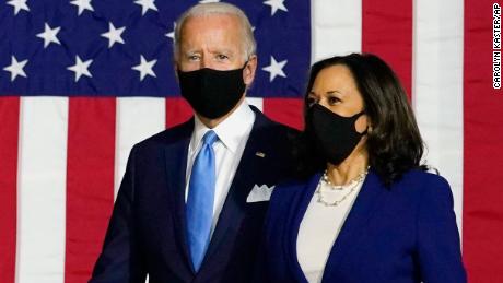 Democratic presidential candidate former Vice President Joe Biden and his running mate Sen. Kamala Harris, D-Calif., arrive to speak at a news conference at Alexis Dupont High School in Wilmington, Del., Wednesday, Aug. 12, 2020. (AP Photo/Carolyn Kaster)