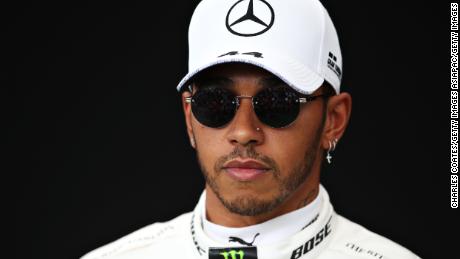 MELBOURNE, AUSTRALIA - MARCH 12: Lewis Hamilton of Great Britain and Mercedes GP poses for a photo in the Paddock during previews ahead of the F1 Grand Prix of Australia at Melbourne Grand Prix Circuit on March 12, 2020 in Melbourne, Australia. (Photo by Charles Coates/Getty Images)