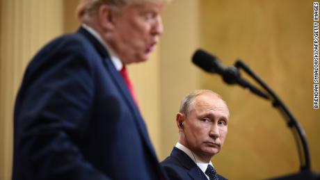 US President Donald Trump (L) and Russia&#39;s President Vladimir Putin attend a joint press conference after a meeting at the Presidential Palace in Helsinki, on July 16, 2018. - The US and Russian leaders opened an historic summit in Helsinki, with Donald Trump promising an &quot;extraordinary relationship&quot; and Vladimir Putin saying it was high time to thrash out disputes around the world. (Photo by Brendan SMIALOWSKI / AFP)        (Photo credit should read BRENDAN SMIALOWSKI/AFP/Getty Images)