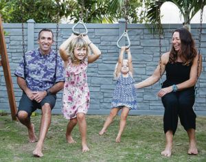 CINDY ELLEN RUSSELL / CRUSSELL@STARADVERTISER.COM
                                Brian and April Citro are high school teachers who are now updating their resumes for teaching in Wyoming and Montana. The couple is considering moving to the mainland in anticipation of the additional financial stress incurred from the upcoming furloughs. They are pictured with their daughters — Gaia, 5, and Rell, 2 — in Kailua.