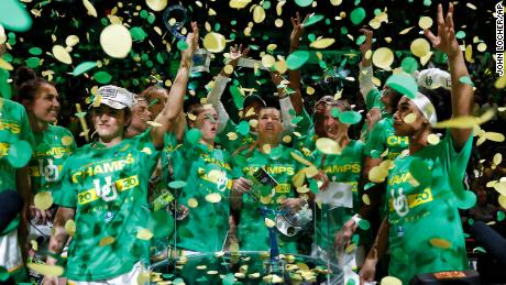 Oregon players celebrate after defeating Stanford in an NCAA college basketball game in the final of the Pac-12 women&#39;s tournament Sunday, March 8, 2020, in Las Vegas. (AP Photo/John Locher)