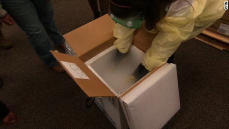 Coronavirus vaccines are unboxed in Michigan