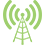 Solid green icon of a communication tower emitting waves on a black background