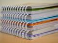 NIFA Resources. Photo of a generic stack of documents; courtesy of Pexels.