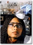 Image of chemist analyzing the contents of a flask