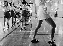 Tap dancing class in the gymnasium at Iowa State College. Ames, Iowa. Photo by Jack Delano, 1942. Prints & Photographs Division