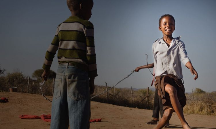 Two children playing. (Photo Credit: State Department)