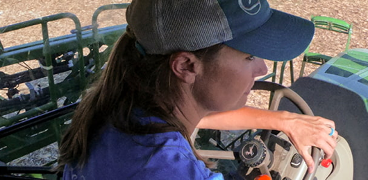 woman on tractor