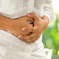 A person clutching their stomach